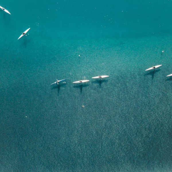 a plane flying over a body of water
