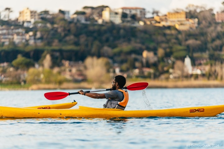 a small boat in a body of water